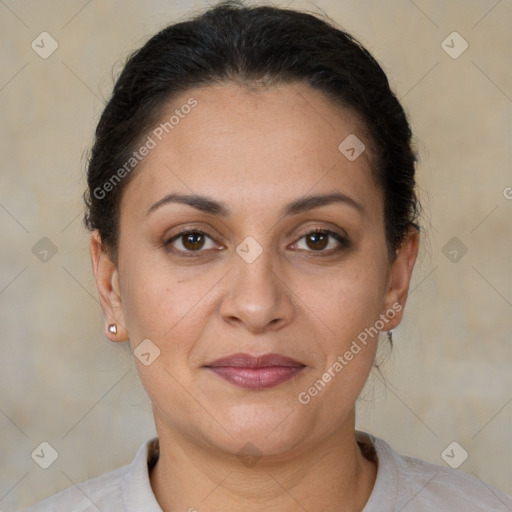 Joyful white adult female with short  brown hair and brown eyes