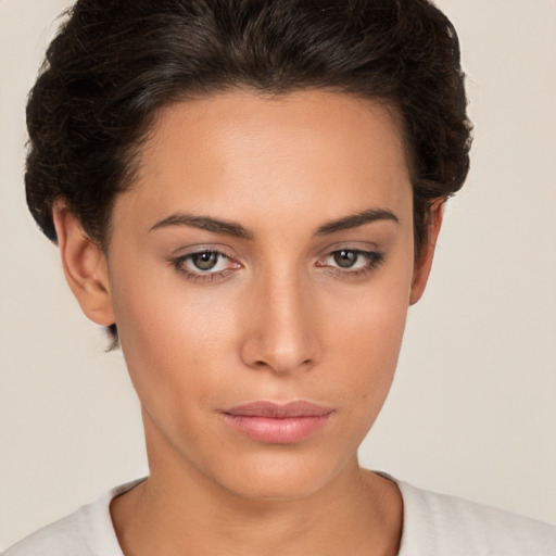 Neutral white young-adult female with short  brown hair and brown eyes