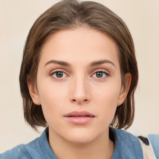 Neutral white young-adult female with medium  brown hair and grey eyes