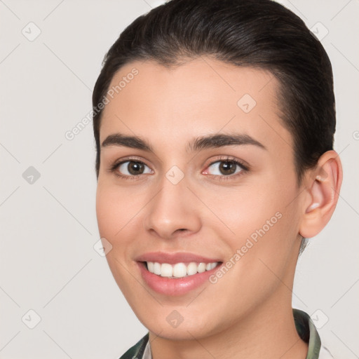 Joyful white young-adult female with short  brown hair and brown eyes