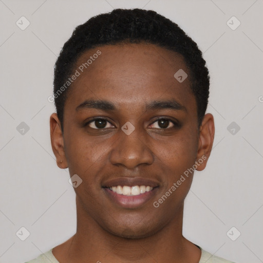 Joyful black young-adult male with short  black hair and brown eyes