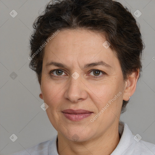 Joyful white adult female with short  brown hair and brown eyes