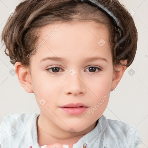 Joyful white child female with short  brown hair and brown eyes