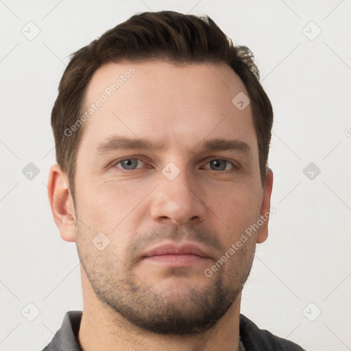 Neutral white young-adult male with short  brown hair and grey eyes