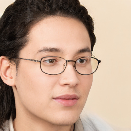 Neutral white young-adult male with medium  brown hair and brown eyes