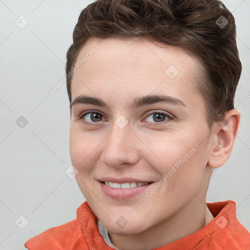 Joyful white young-adult female with short  brown hair and grey eyes