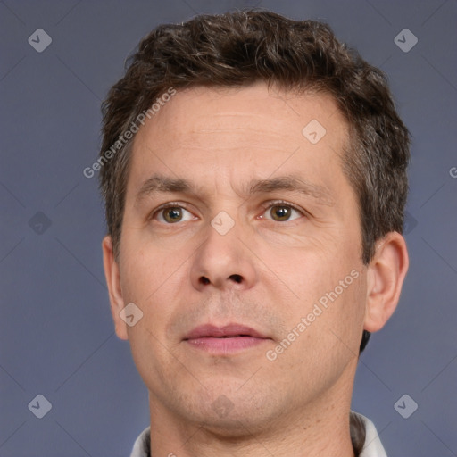 Neutral white adult male with short  brown hair and brown eyes