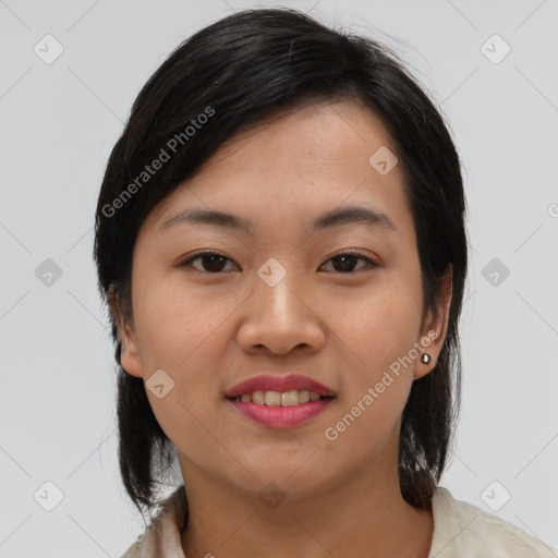 Joyful asian young-adult female with medium  black hair and brown eyes