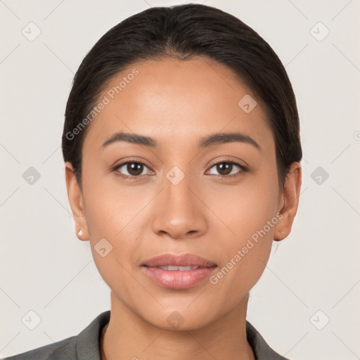 Joyful latino young-adult female with short  brown hair and brown eyes