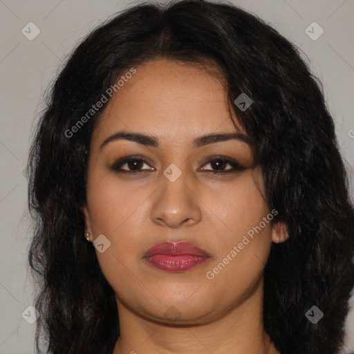 Joyful latino young-adult female with long  brown hair and brown eyes