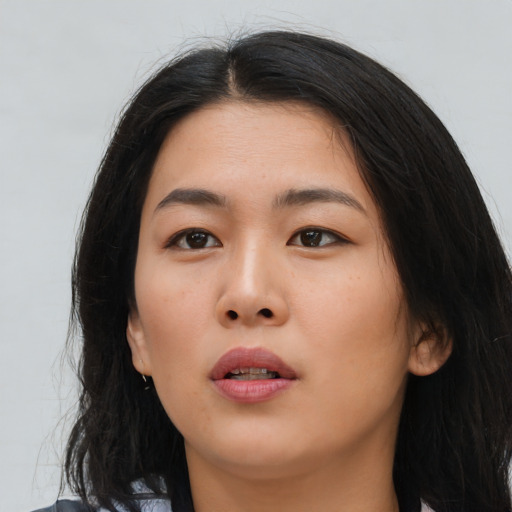 Neutral asian young-adult female with long  black hair and brown eyes