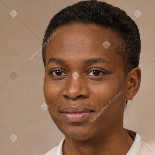 Joyful black young-adult female with short  brown hair and brown eyes