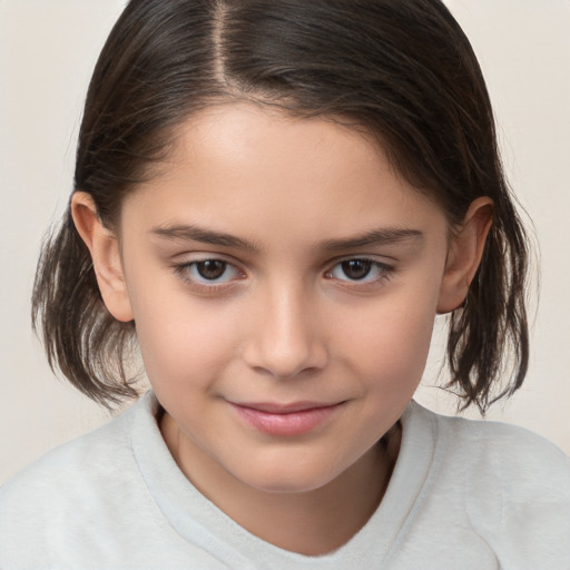 Joyful white child female with medium  brown hair and brown eyes