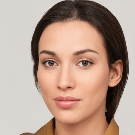 Neutral white young-adult female with medium  brown hair and brown eyes