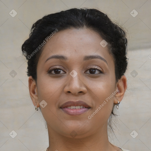 Joyful latino young-adult female with short  brown hair and brown eyes