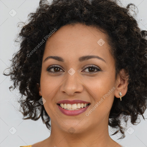 Joyful latino young-adult female with long  brown hair and brown eyes