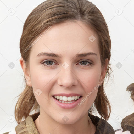 Joyful white young-adult female with medium  brown hair and blue eyes