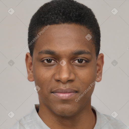 Joyful black young-adult male with short  brown hair and brown eyes