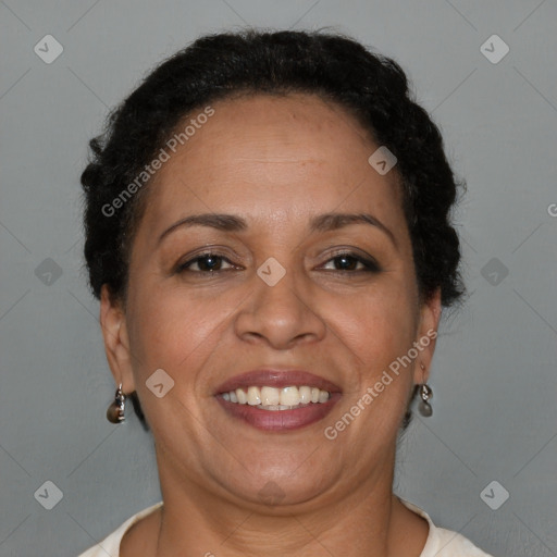 Joyful latino adult female with short  brown hair and brown eyes