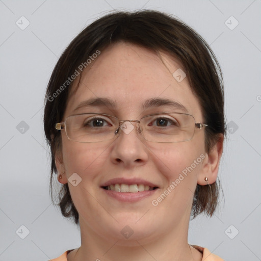 Joyful white adult female with medium  brown hair and brown eyes