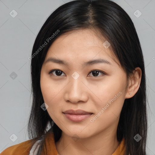 Joyful asian young-adult female with medium  brown hair and brown eyes