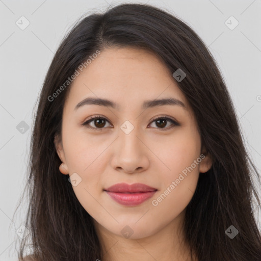 Joyful latino young-adult female with long  brown hair and brown eyes