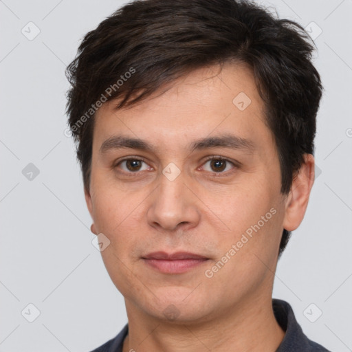 Joyful white young-adult male with short  brown hair and brown eyes