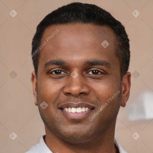 Joyful latino young-adult male with short  brown hair and brown eyes