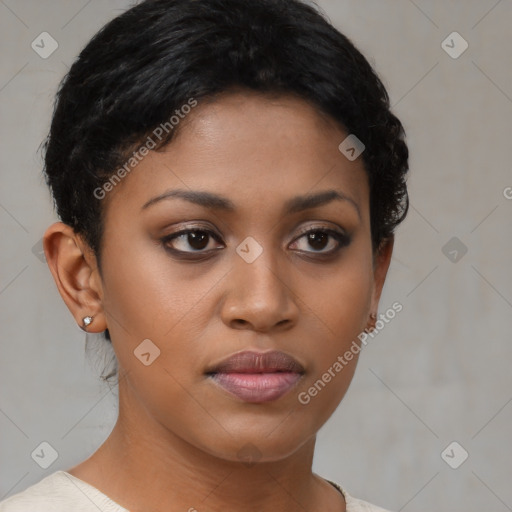 Joyful black young-adult female with short  brown hair and brown eyes