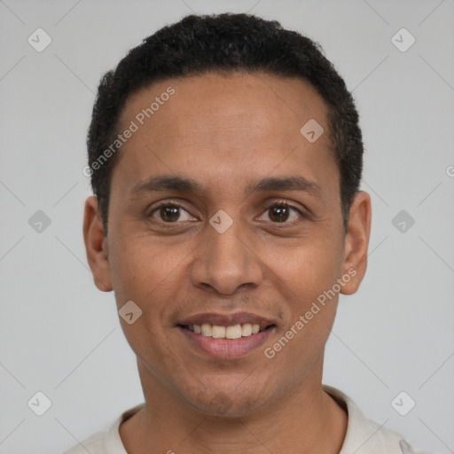 Joyful latino young-adult male with short  black hair and brown eyes