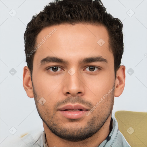 Neutral white young-adult male with short  brown hair and brown eyes