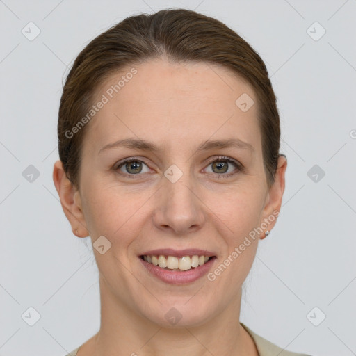 Joyful white young-adult female with long  brown hair and grey eyes