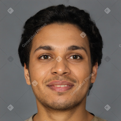 Joyful latino young-adult male with short  brown hair and brown eyes