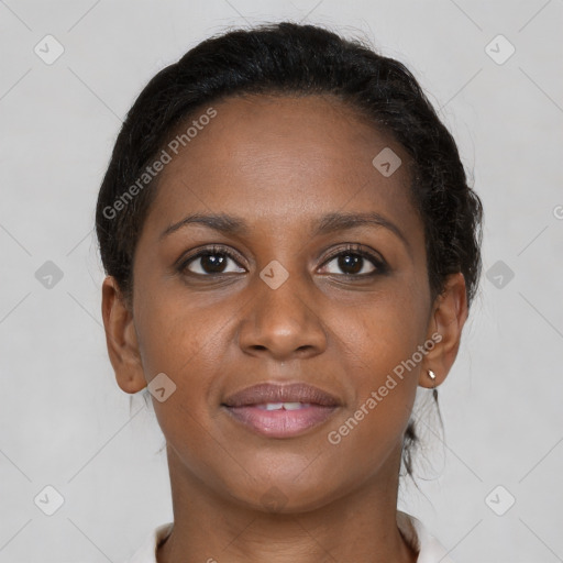 Joyful black young-adult female with medium  brown hair and brown eyes