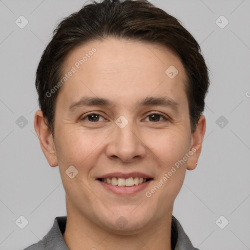 Joyful white adult male with short  brown hair and brown eyes