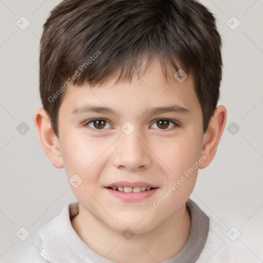 Joyful white child male with short  brown hair and brown eyes