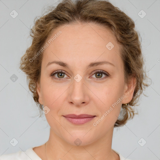 Joyful white young-adult female with medium  brown hair and green eyes