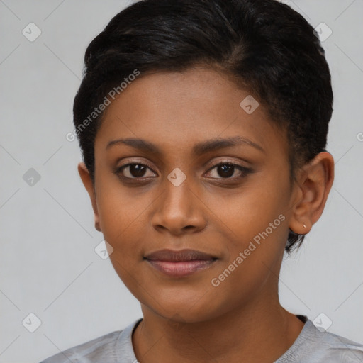 Joyful black young-adult female with short  brown hair and brown eyes