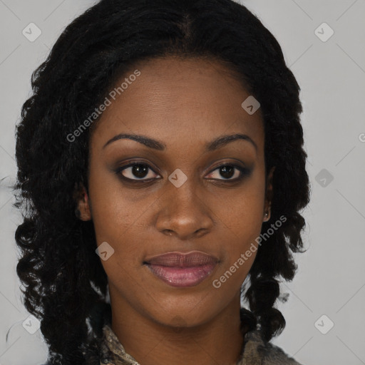 Joyful black young-adult female with long  brown hair and brown eyes