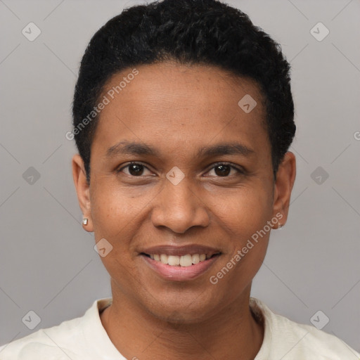 Joyful black young-adult male with short  black hair and brown eyes