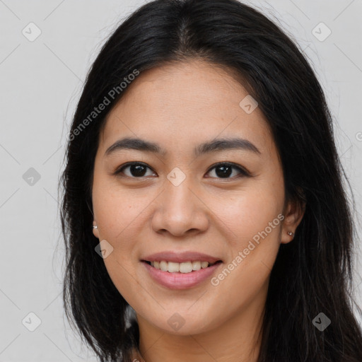 Joyful asian young-adult female with long  brown hair and brown eyes