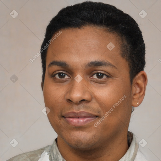 Joyful black young-adult male with short  black hair and brown eyes