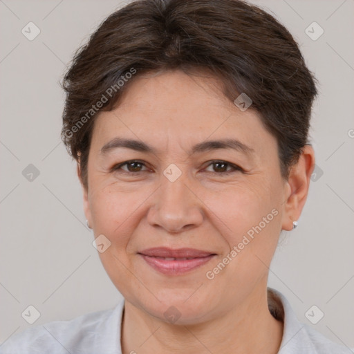 Joyful white adult female with short  brown hair and brown eyes