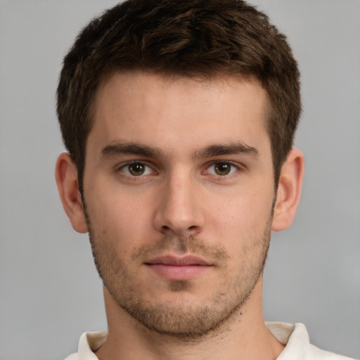 Neutral white young-adult male with short  brown hair and brown eyes