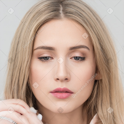 Neutral white young-adult female with long  brown hair and brown eyes