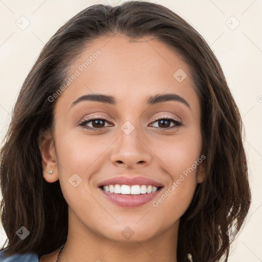 Joyful white young-adult female with long  brown hair and brown eyes