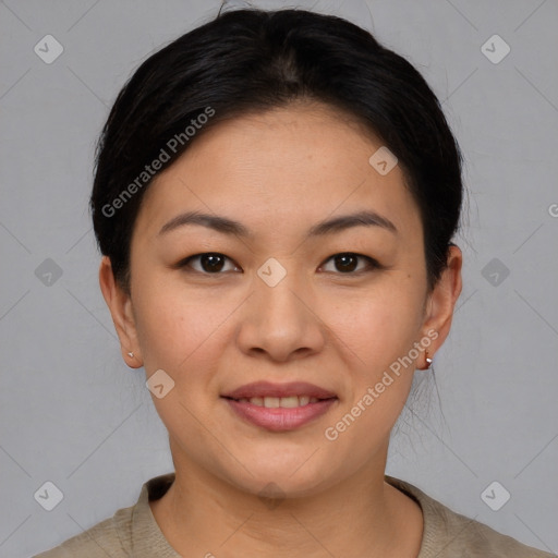 Joyful asian young-adult female with short  brown hair and brown eyes