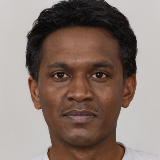 Neutral black adult male with short  black hair and brown eyes