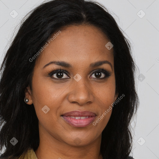 Joyful black young-adult female with long  brown hair and brown eyes