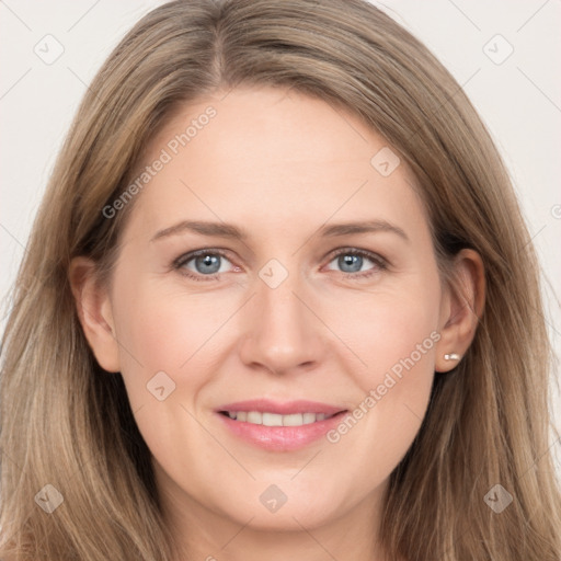 Joyful white young-adult female with long  brown hair and grey eyes